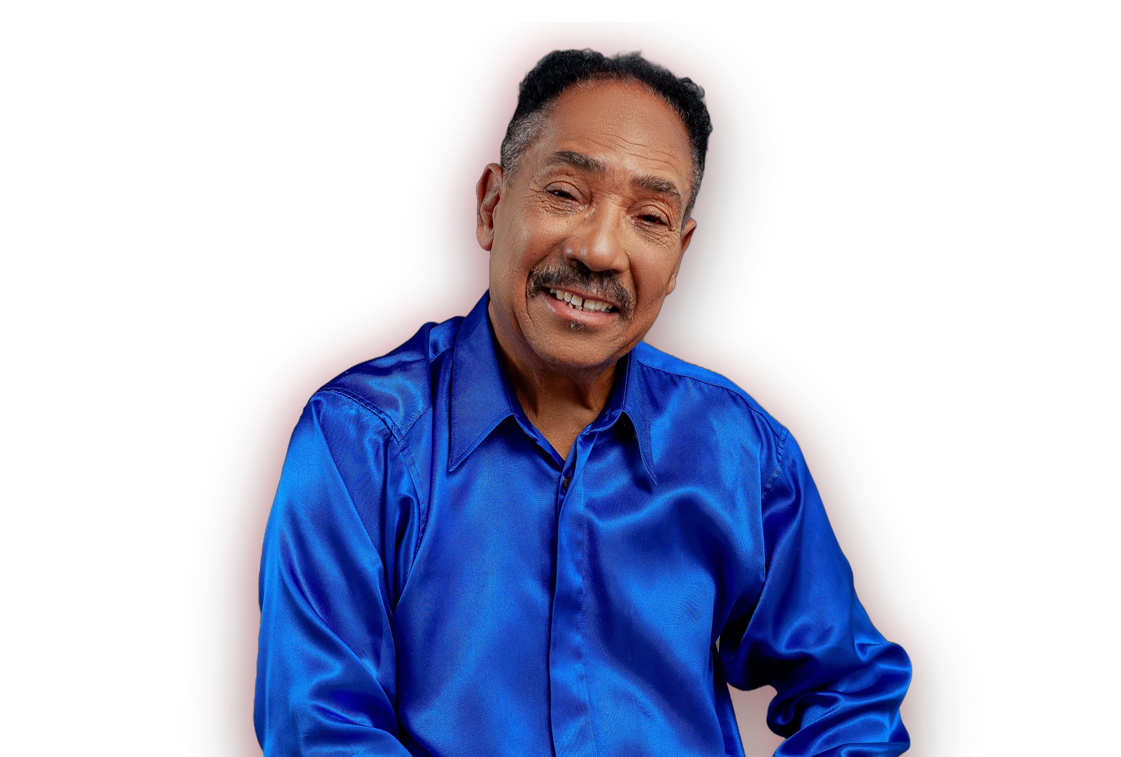 Voto Gonçalves smiling, in a blue satin shirt