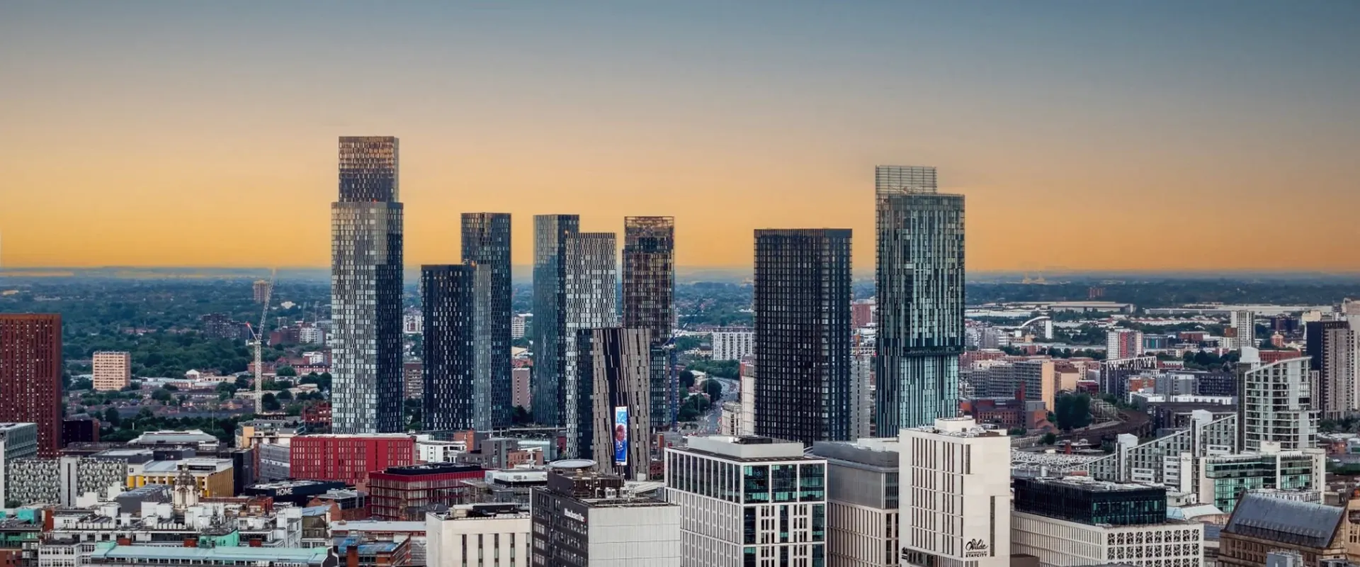 Manchester city centre towers at sunset