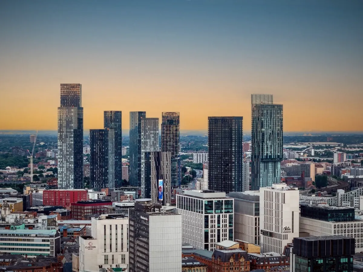 Manchester city centre towers at sunset